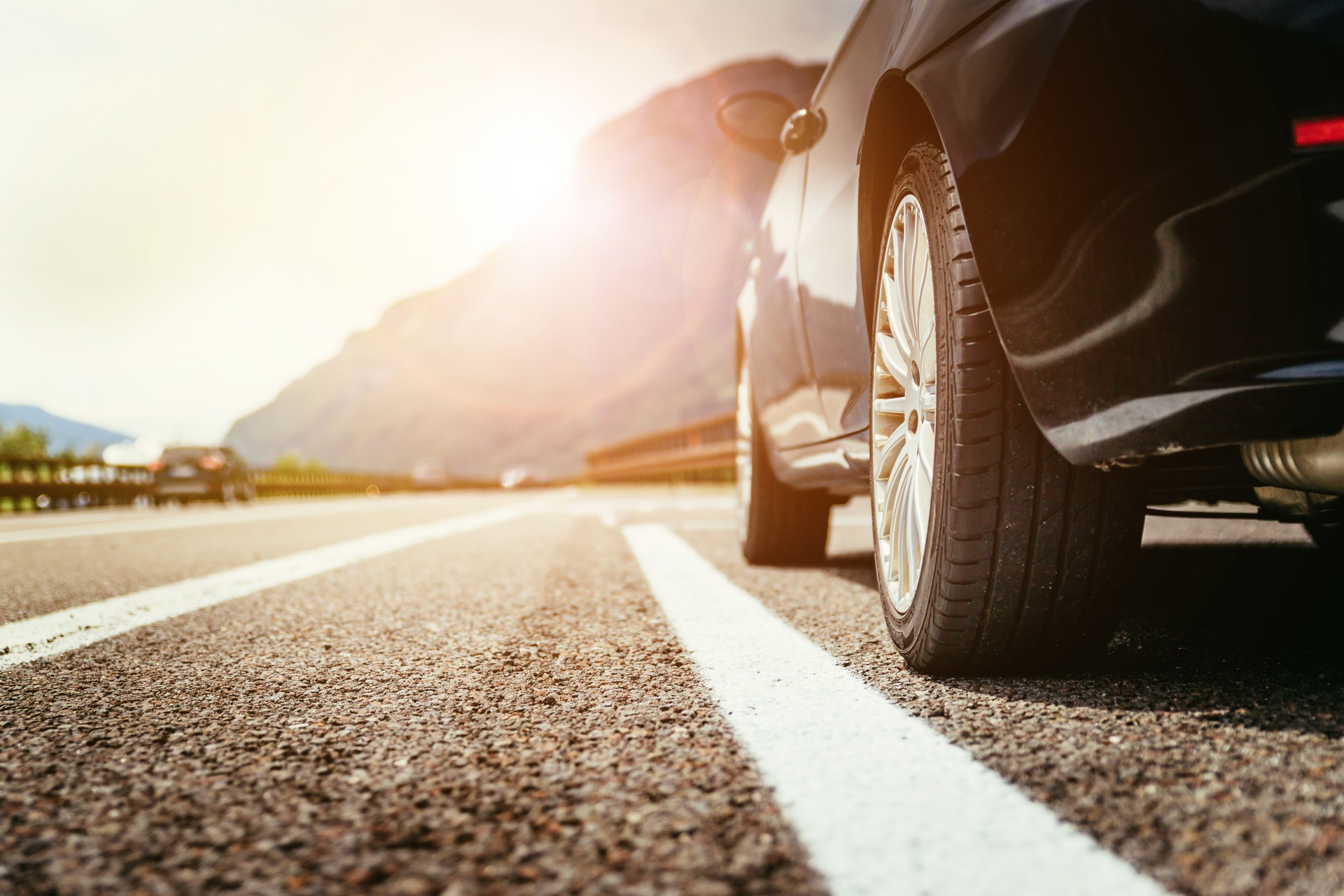 Car is standing on the breakdown lane, asphalt and tyre, Italy